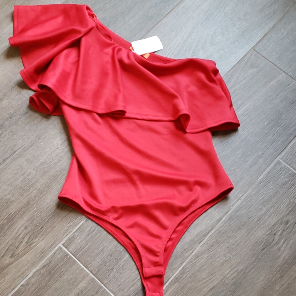 One should red ruffle top